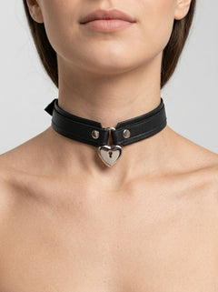 Close-up of the Heart Lock Choker, featuring a stunning heart-shaped lock, highlighting the exquisite craftsmanship of the Strict Locking Heart Collar.