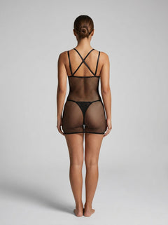 Back view of the Pink Lipstick Spellbinding Fishnet Dress in Black, featuring striking cross-strap detail that beautifully frames the body, an ultimate choice in luxurious fishnet dress design.