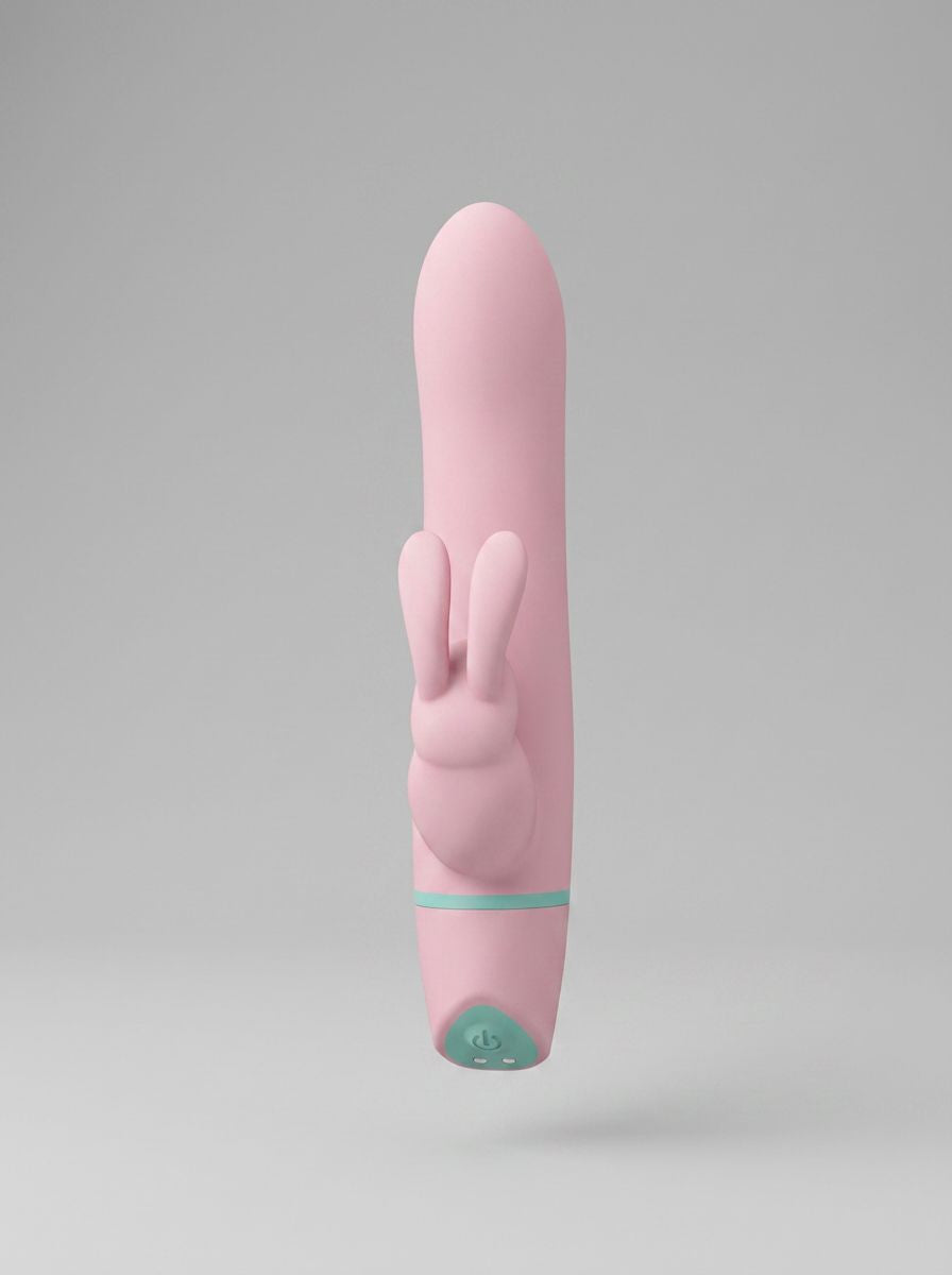 MINA Ripple 5-function rotating rabbit vibrator with clitoral stimulation, waterproof design, pink silicone finish, and textured surface.