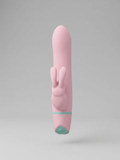 MINA Ripple 5-function rotating rabbit vibrator with clitoral stimulation, waterproof design, pink silicone finish, and textured surface.