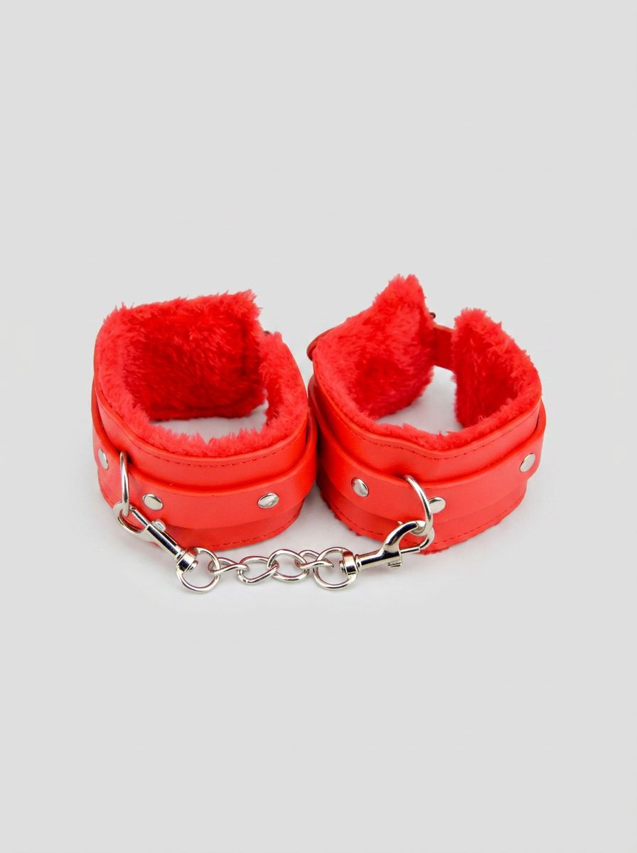 Bound to Please furry plush BDSM wrist cuffs showing soft, comfortable restraints with stylish design and plush fabric detail.