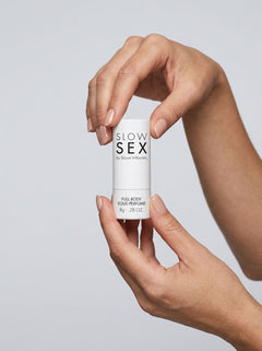 Indulgent Slow Sex Full Body Massage Oil Scented Solid Perfume reflecting a silk-smooth texture ideal for couples' massage.