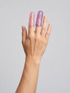Lust Ribbed Textured Jelly Finger Sleeves by Me You Us, showcasing vibrant pink and purple colours designed for enhancing pleasure with textured finger sleeves.