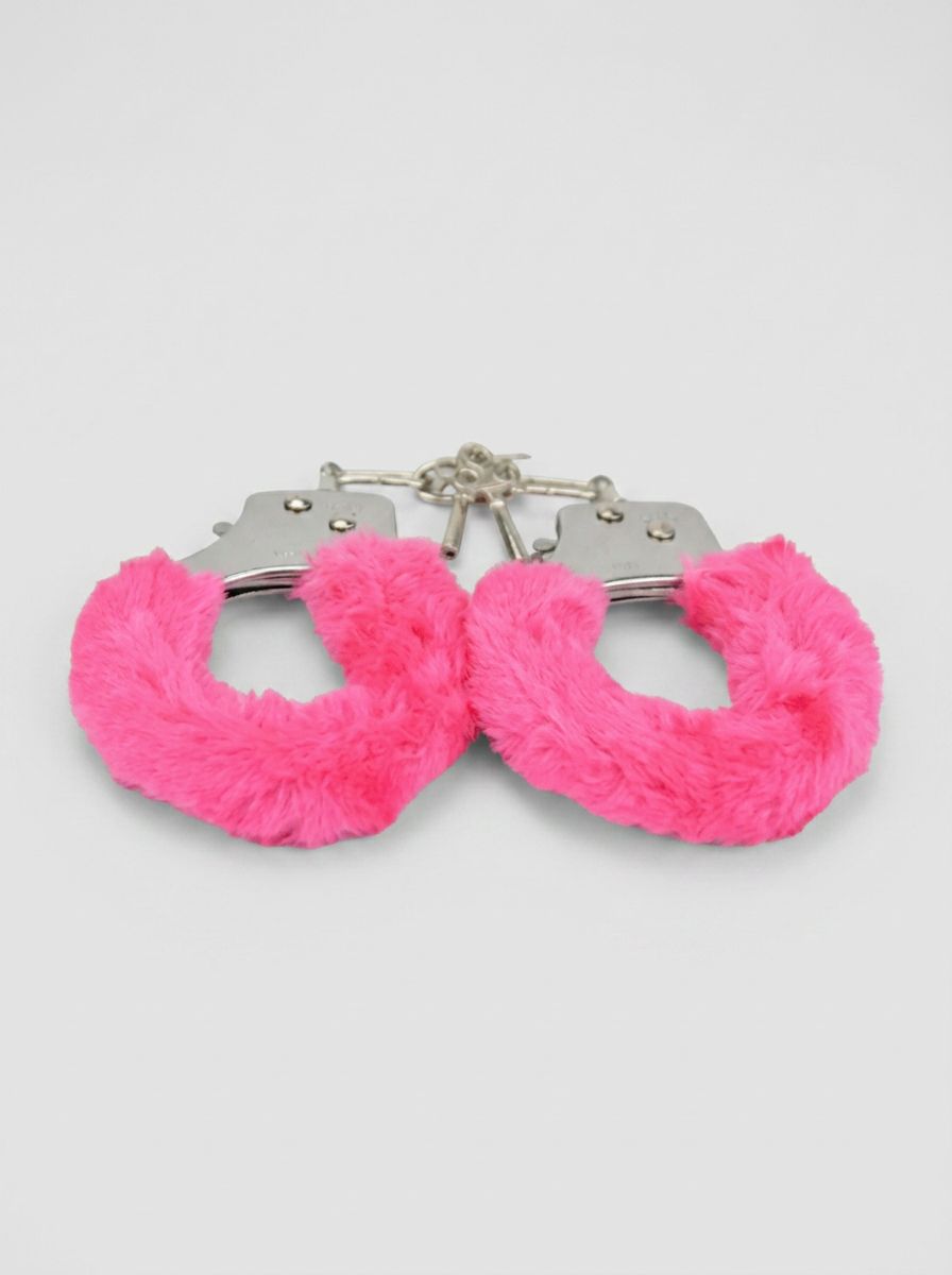 Heavy duty furry handcuffs by Bound to Play, adjustable and comfortable cuffs with soft fur lining for secure restraint.