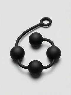 Artistic angle of Prowler RED Silicone Anal Beads in a relaxed position, emphasizing the sophisticated design.