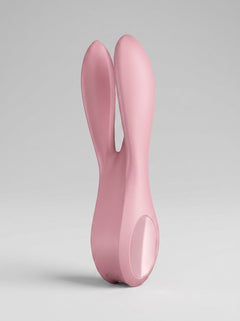 Stylish image of the Satisfyer Threesome 1 – Pink Lay-On Triple Motor Vibrator demonstrating multiple vibration settings for personalized pleasure and luxury.