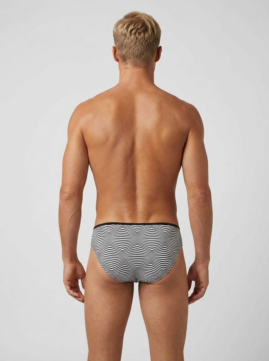 Men's black and white striped mini bikini brief by Male Power, showcasing a snug fit and bold stripe design.