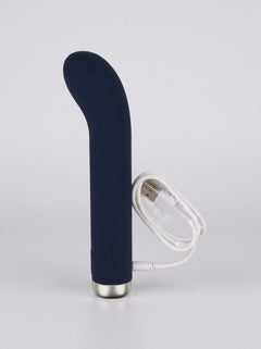 Stylish Nauti 10 Function G-Spot Vibrator in a serene setting, illustrating its versatility for solo or partner use.