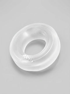 Flat lay of Hunkyjunk HUJ C Ring - Distinctive silicone cock ring elevating intimate encounters.