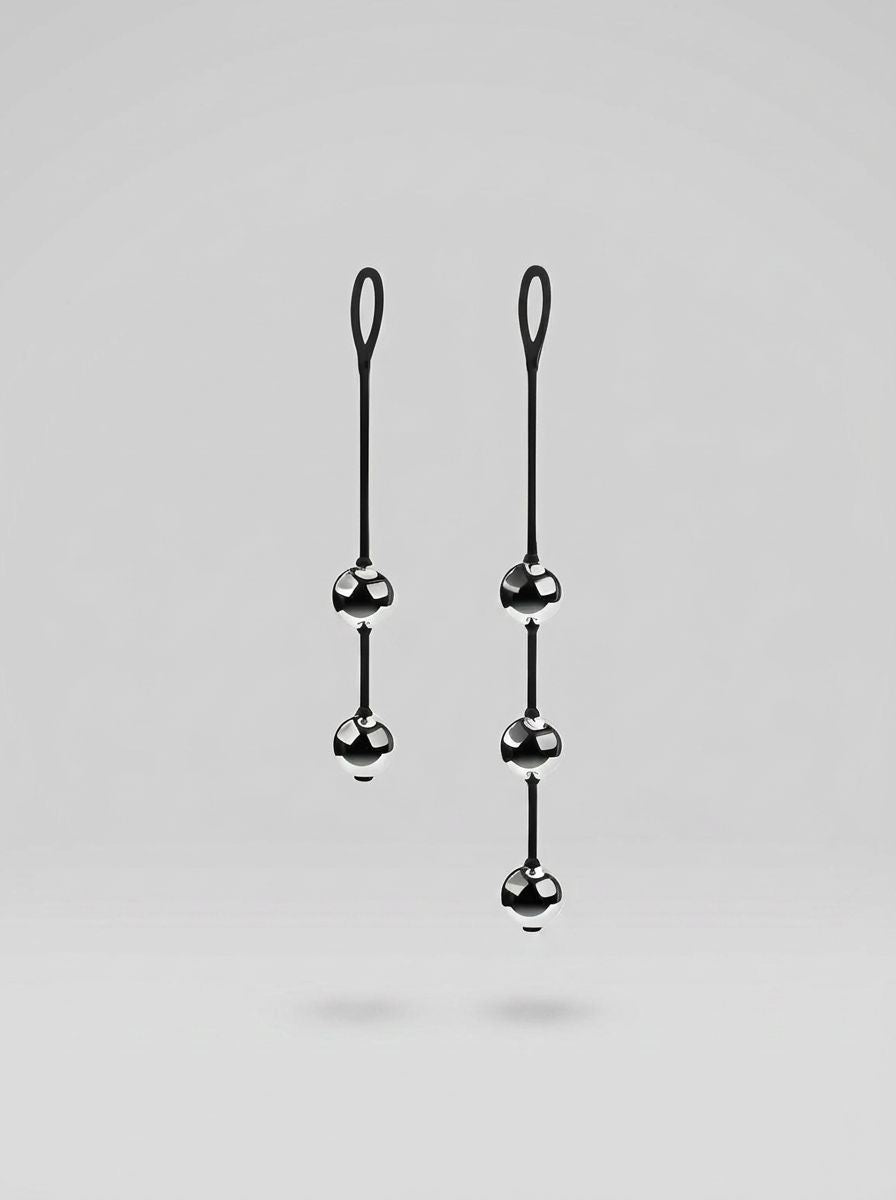 Scandals Heavy Metal Ben Wa Balls - Premium Kegel Balls for Enhanced Stimulation, showcasing luxurious polished steel design, ideal for those seeking pleasure with metal ben wa balls.