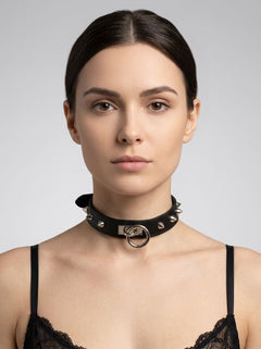 Stylish Leather O-Ring Studded Choker showcasing its intricate riveted detailing, ideal for fashionable choker lovers.