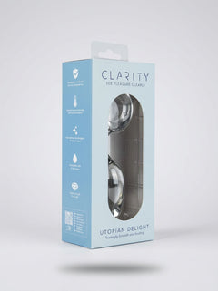 Clarity Utopian Delight 3.5 Inch Glass Butt Plug in branded packaging, angled view showing product details and clear glass design
