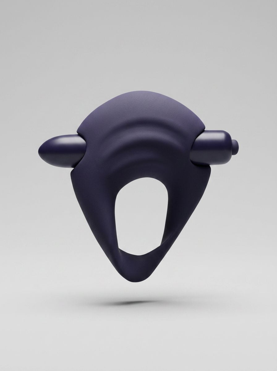 Navy blue You Love Me vibrating silicone cock ring with textured design and small vibrator for enhanced pleasure.
