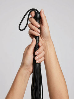 Sleek design of the Prowler RED Hard Whip - 34 Inch Leather BDSM Impact Flogger, featuring a luxurious leather finish and precision handling for an elevated experience.