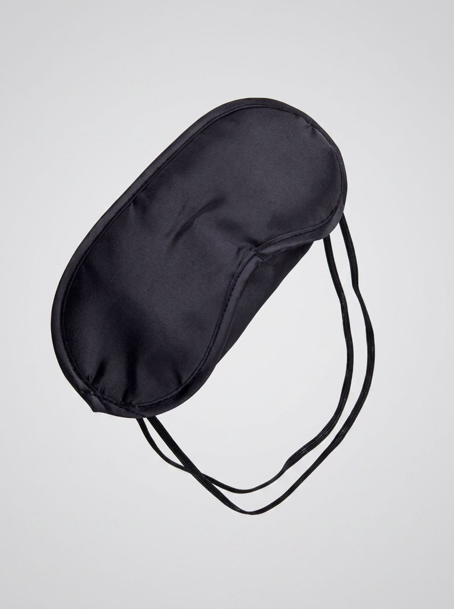 Black double-strap blindfold from Scandals for bondage and fetish sensory play, featuring adjustable straps and soft fabric.