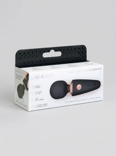 Lifestyle shot of Le Wand Mini Micro Massage Wand Vibrator - a chic mini massage wand that combines luxury with functionality.