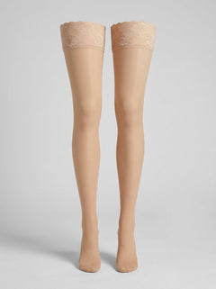 Luxury sheer thigh high stockings with lace top, available in Black, White, Red, and Nude, perfect for enhancing your lingerie collection.