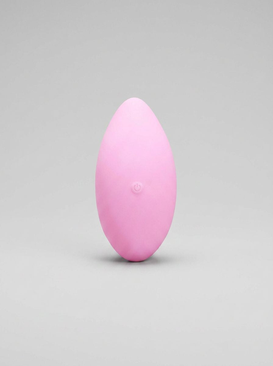 Me You Us Lay-On Panty Vibrator showcasing its luxurious pink silicone design, perfect for ultimate pleasure.