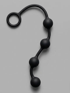 Large Silicone Anal Beads for Advanced Play in 3 Sizes by Scandals, artistically arranged to illustrate their perfect design for intimate exploration.