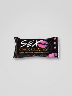 Two pieces of Sweet Treats Sex Chocolate gourmet aphrodisiac in 10g servings, showcasing rich, decadent chocolate for romantic indulgence.