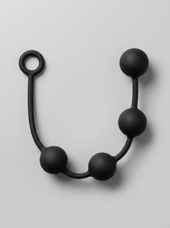 Elegant shot of Prowler RED Silicone Anal Beads, highlighting their unique shape made for smooth insertion and luxurious comfort.