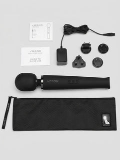 Le Wand Rechargeable Wand Massager Vibrator Black laid out with travel pouch, charging cable, adaptor plugs and instruction guides.