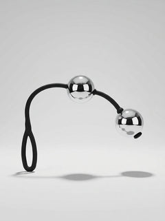 Close up of Scandals Heavy Metal Ben Wa Balls, highlighting their smooth, high-polished surface designed for ultimate stimulation and pleasure with metal ben wa balls.