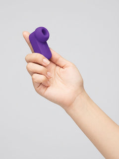 Me You Us Signature The Travel Tapper Pulsating Clitoral Suction Vibrator in purple, luxury clitoral suction vibrator product view