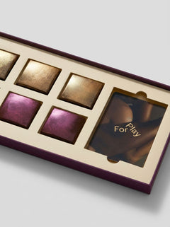 Luxury packaging of For Play His and Hers Couples Sex Chocolate featuring chocolate blends for him and her.