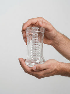 Transparent Ripple Dual End Stroker male masturbator by Me You Us, showing textured interior and sleek exterior design.