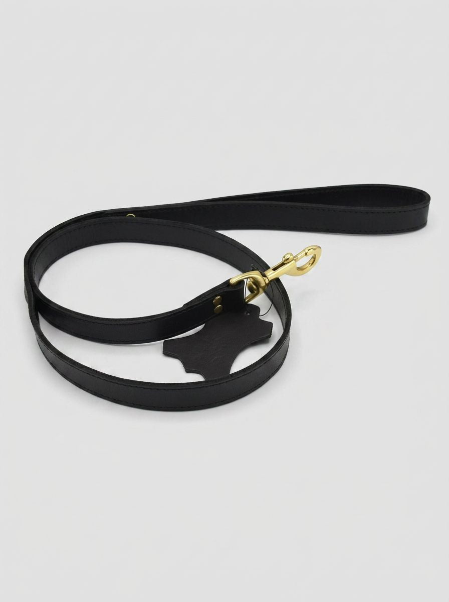 Bound Noir Nubuck Leather Leash with Brass Details elegantly displayed, showcasing its luxurious leather craftsmanship, perfect for those seeking a sophisticated Leather Leash.