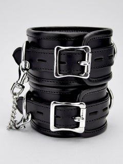 Bound Leather Ankle Restraints with padlockable buckle prongs for secure and stylish restraint options.