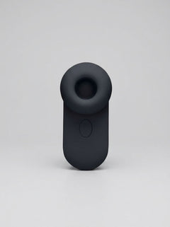 Me You Us Signature The Travel Tapper Pulsating Clitoral Suction Vibrator showing its compact travel-friendly design and clitoral suction vibrator tip
