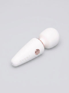 Le Wand Mini Micro Rechargeable Massage Wand Vibrator in stylish settings - embodying the essence of luxury in a compact mini massage wand.