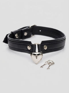 Sophisticated Strict Locking Heart Collar with included keys, set against a plush background, representing intimacy and elegance in accessories.