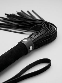 Short Suede Flogger - A stunning representation of luxury in BDSM accessories, featuring a comfortable spiral-wrapped handle for unmatched grip and control.