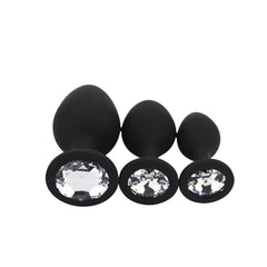 Toosh Silicone Butt Plug Set of 3 – Black with Clear Gem Base, featuring a stylish gem base for an elegant and luxurious touch.