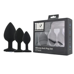 Toosh Silicone Butt Plug Set of 3 – Black with Clear Gem Base, displaying the three different sizes ideal for progressional pleasure.