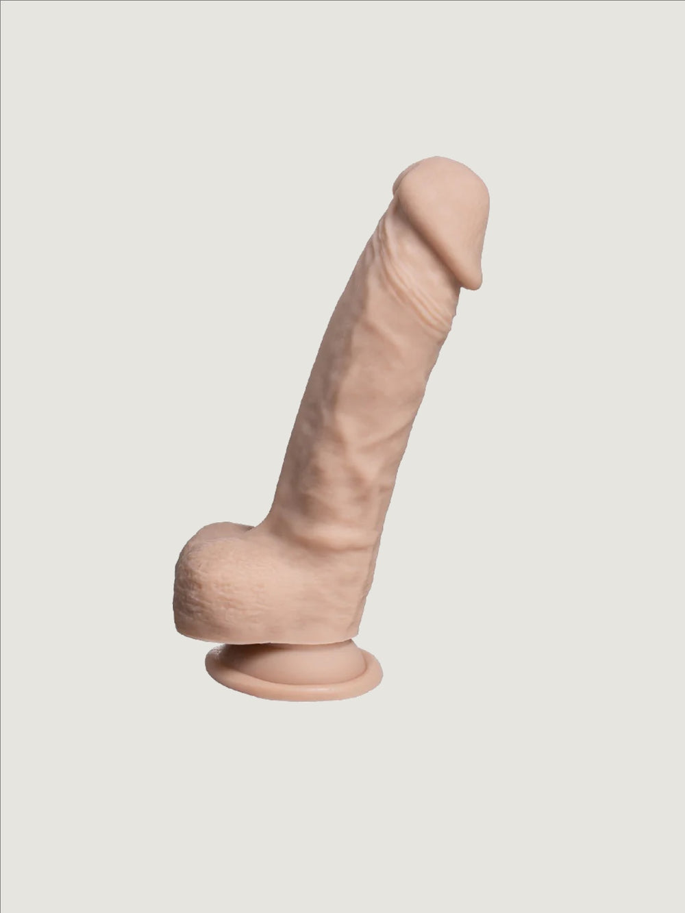 SilexD 7-inch real skin liquid silicone dildo with suction cup, balls, and thermo-reactive design for adult pleasure.