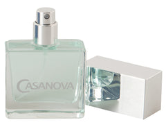 a bottle of cologne sitting next to a white box