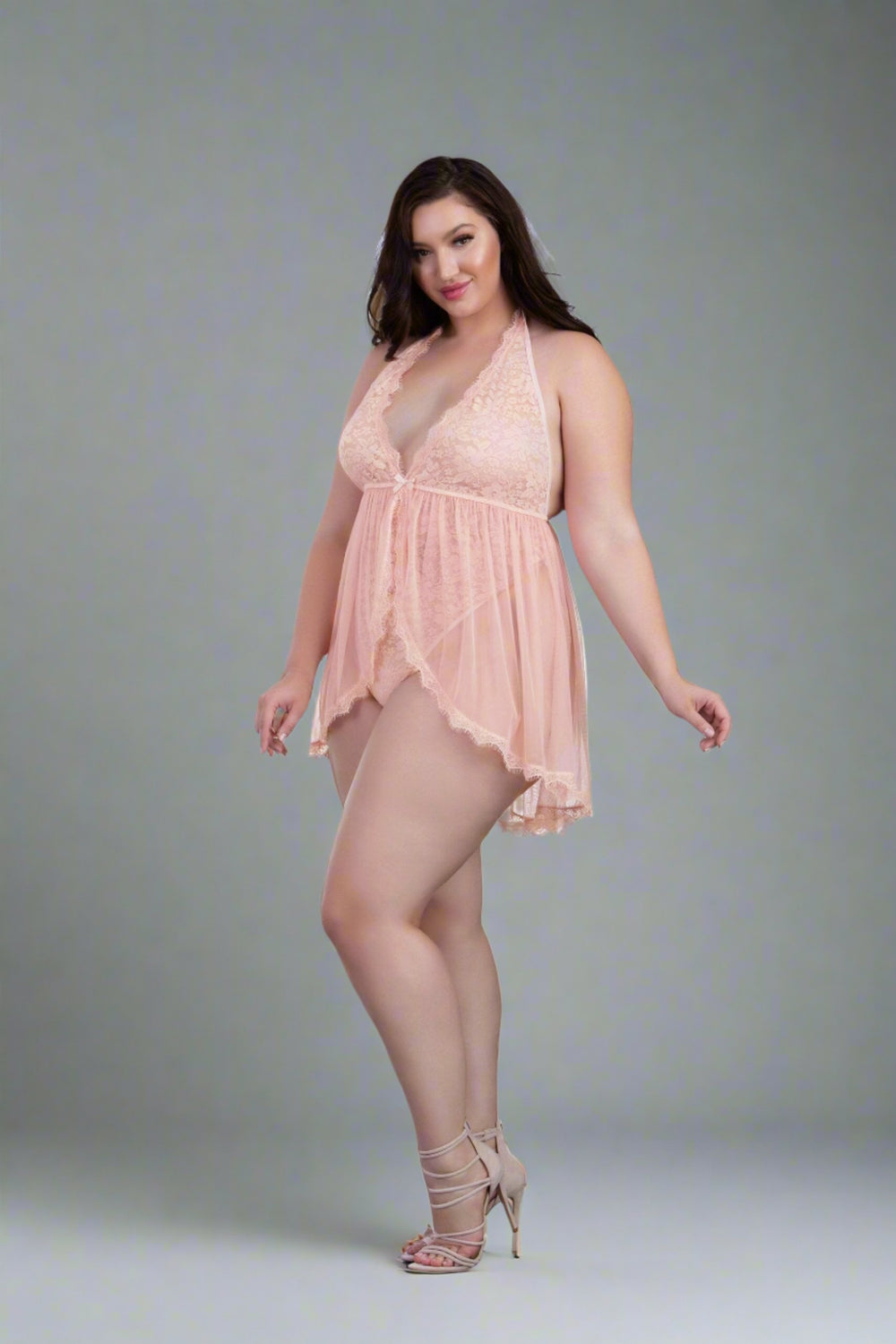 Pink champagne lace plunge halter teddy with skirt overlay, featuring a flattering fit and delicate lace details from NEW TEMPTATIONS 3.