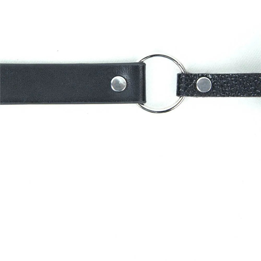 a black leather strap with a metal ring