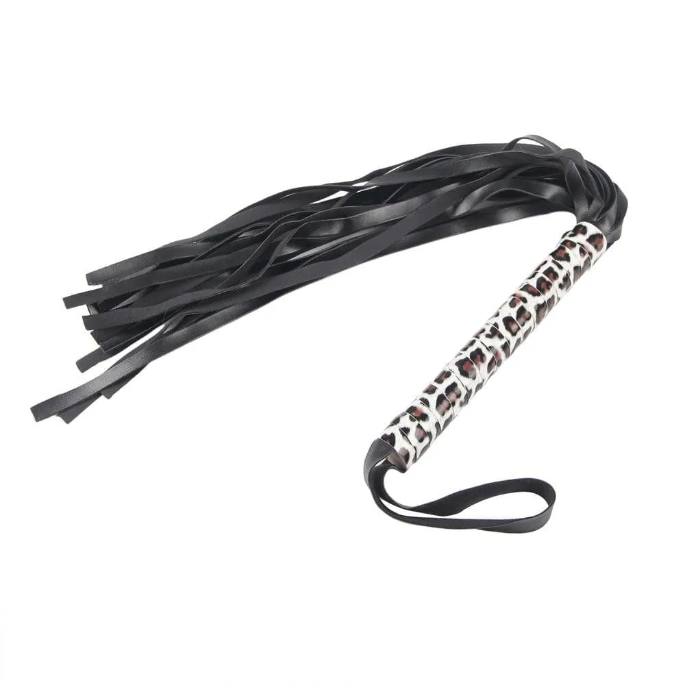 a black flogger with leopard print handle