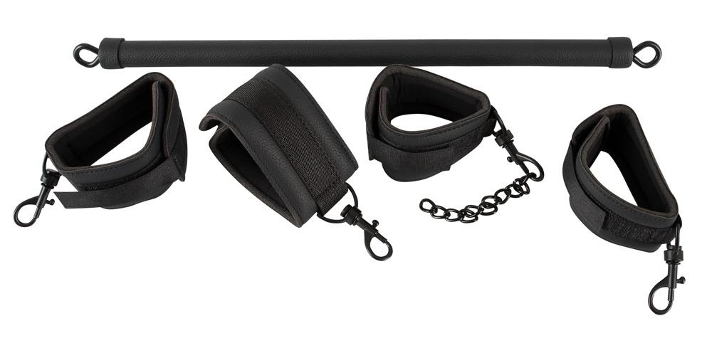 Fetish Collection four cuff spreader bar restraint with adjustable cuffs and metal bar for BDSM bondage play.