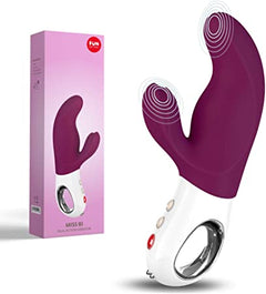 a white and purple device next to a box