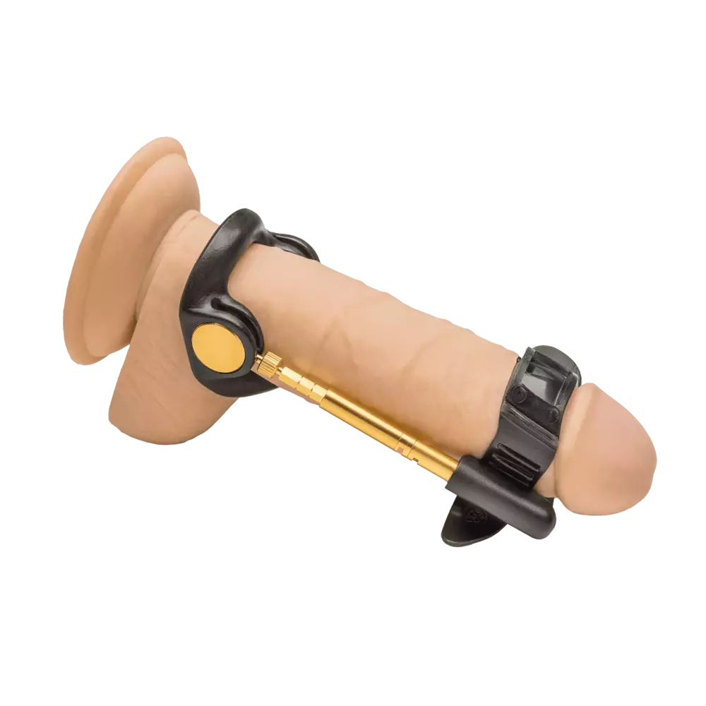 Jes-Extender GOLD penis extender device shown on white background, designed for natural penile lengthening and enhancement.