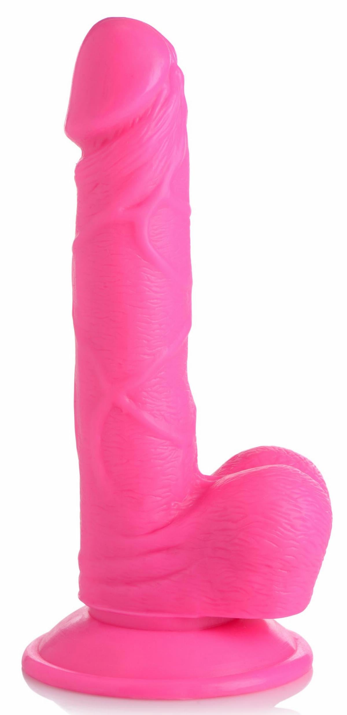 a large pink toy with a long tail