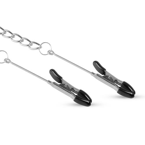 Silver nipple clamps with long chain from Easytoys Fetish Collection, featuring adjustable clamps and dangling chain for sensation play.