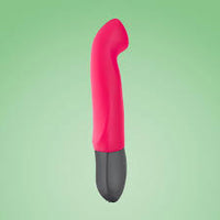 Thumbnail for a pink vibrating device floating in the air on a green background