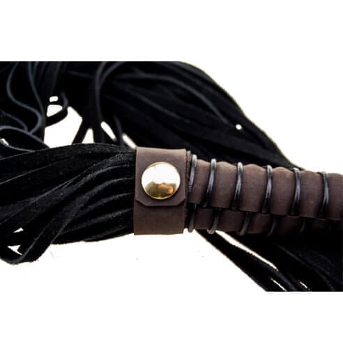Bound to Please powerful nubuck leather flogger for BDSM play, featuring multiple tails and sturdy handle.